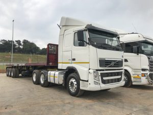 2011 Volvo FH400 with 1600000km and 2002 Motor Rail Flat Deck Trailer for sale