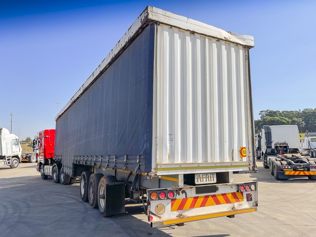 1997 Afrit Tautliner Triaxle Welldeck Trailer for sale